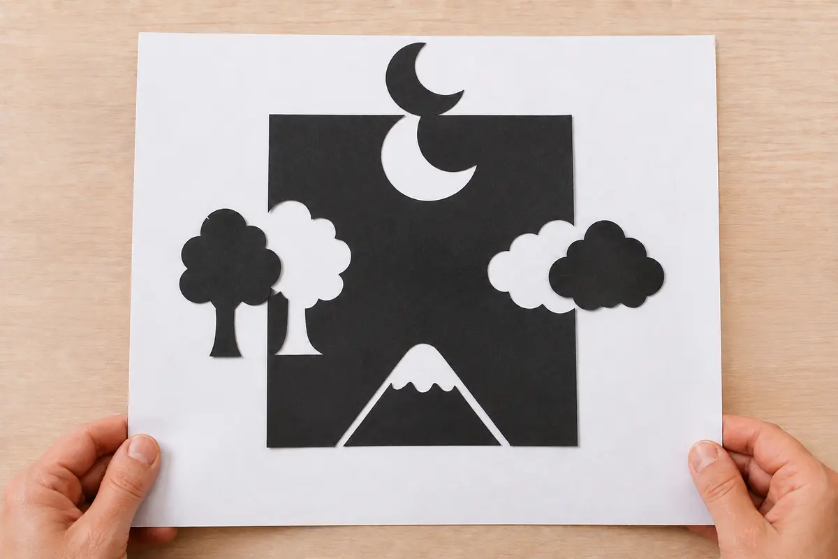 Réaliser un paysage en papier découpé selon l'art japonais du notan