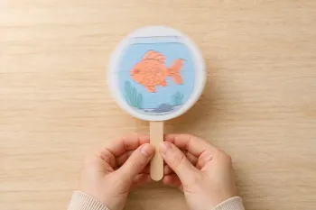 Fabriquer un thaumatrope poisson-aquarium sans ficelle
