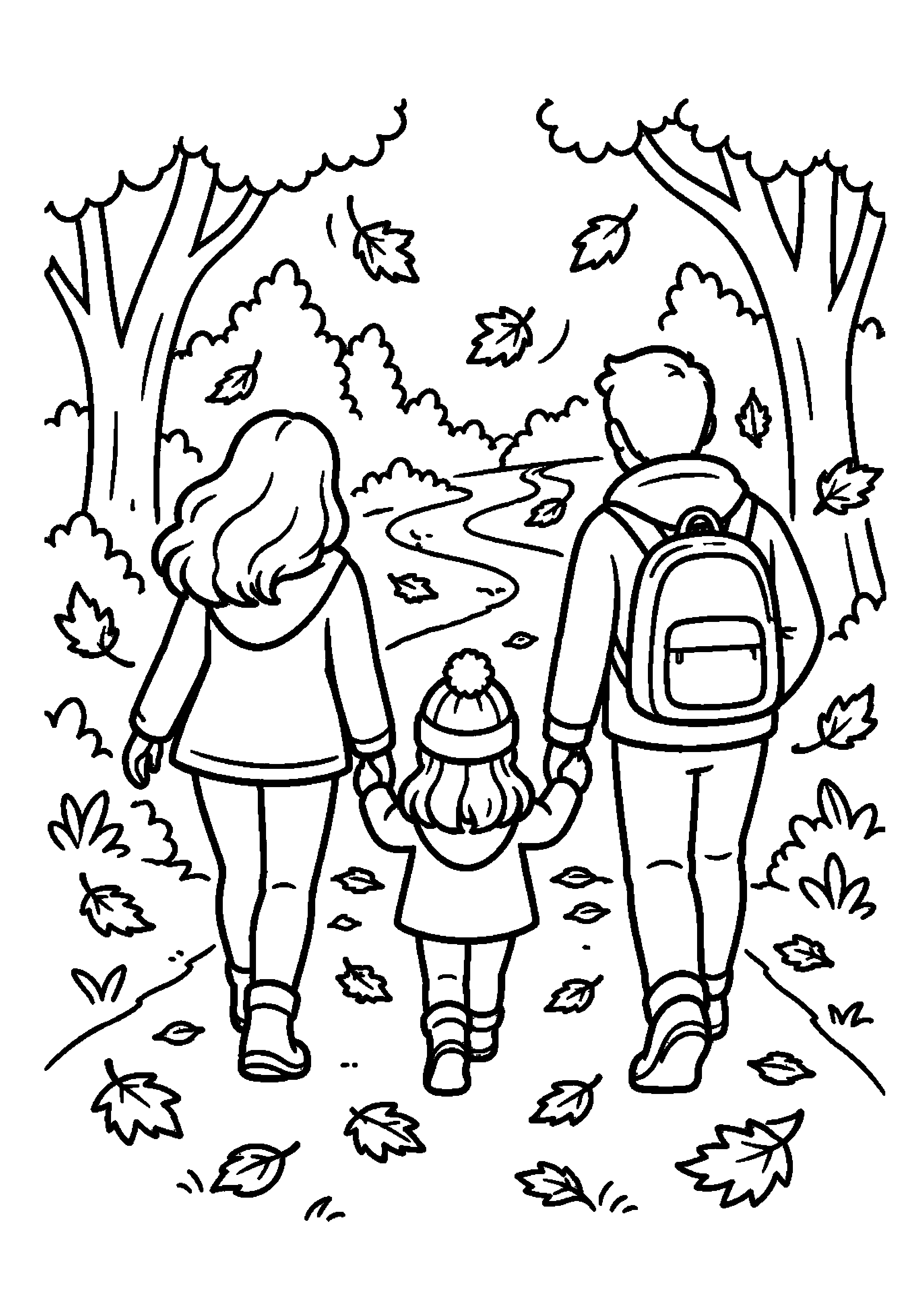 Famille marchant sur un sentier dans une forêt d'automne