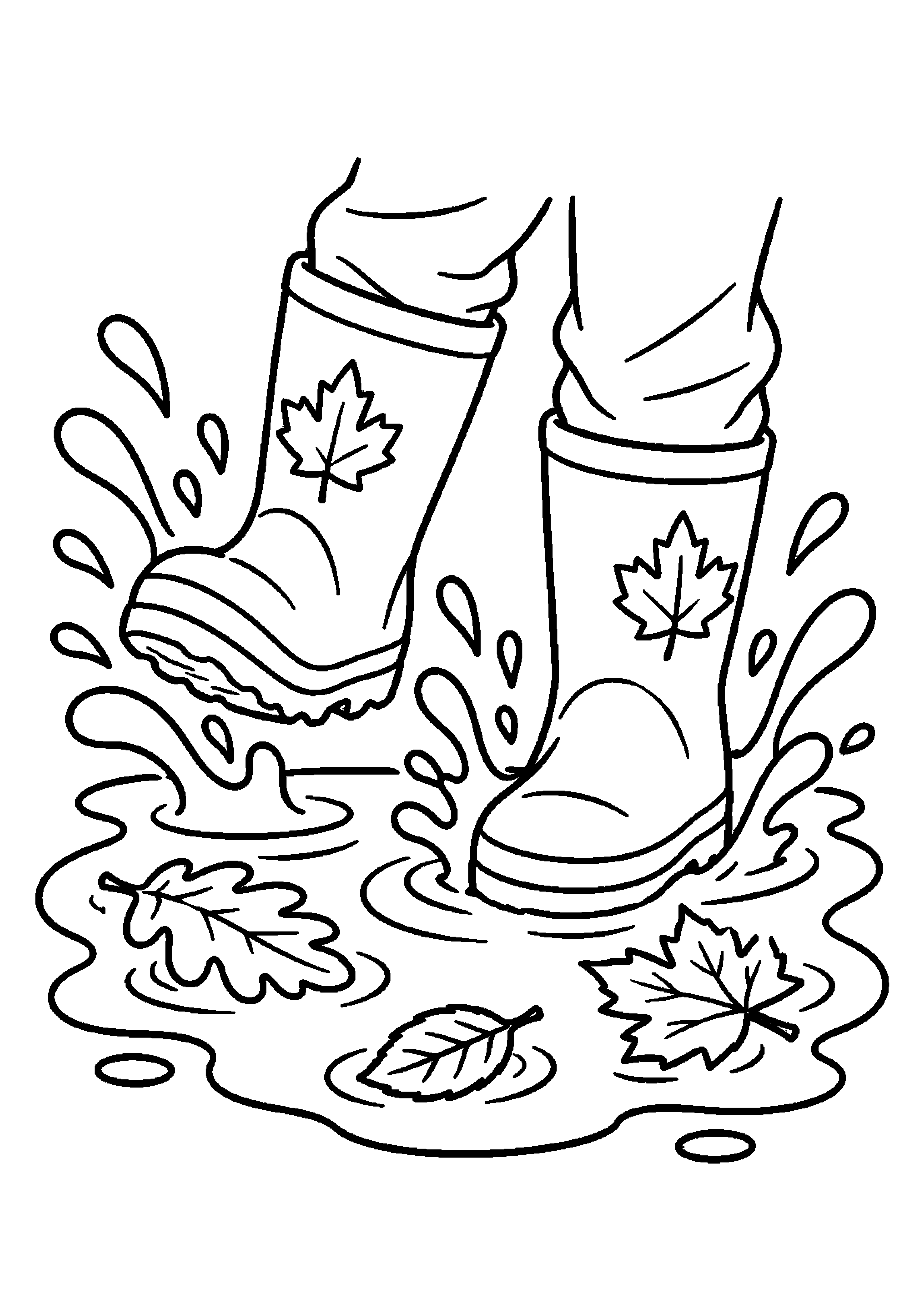 Paire de bottes de pluie éclaboussant une flaque avec des feuilles