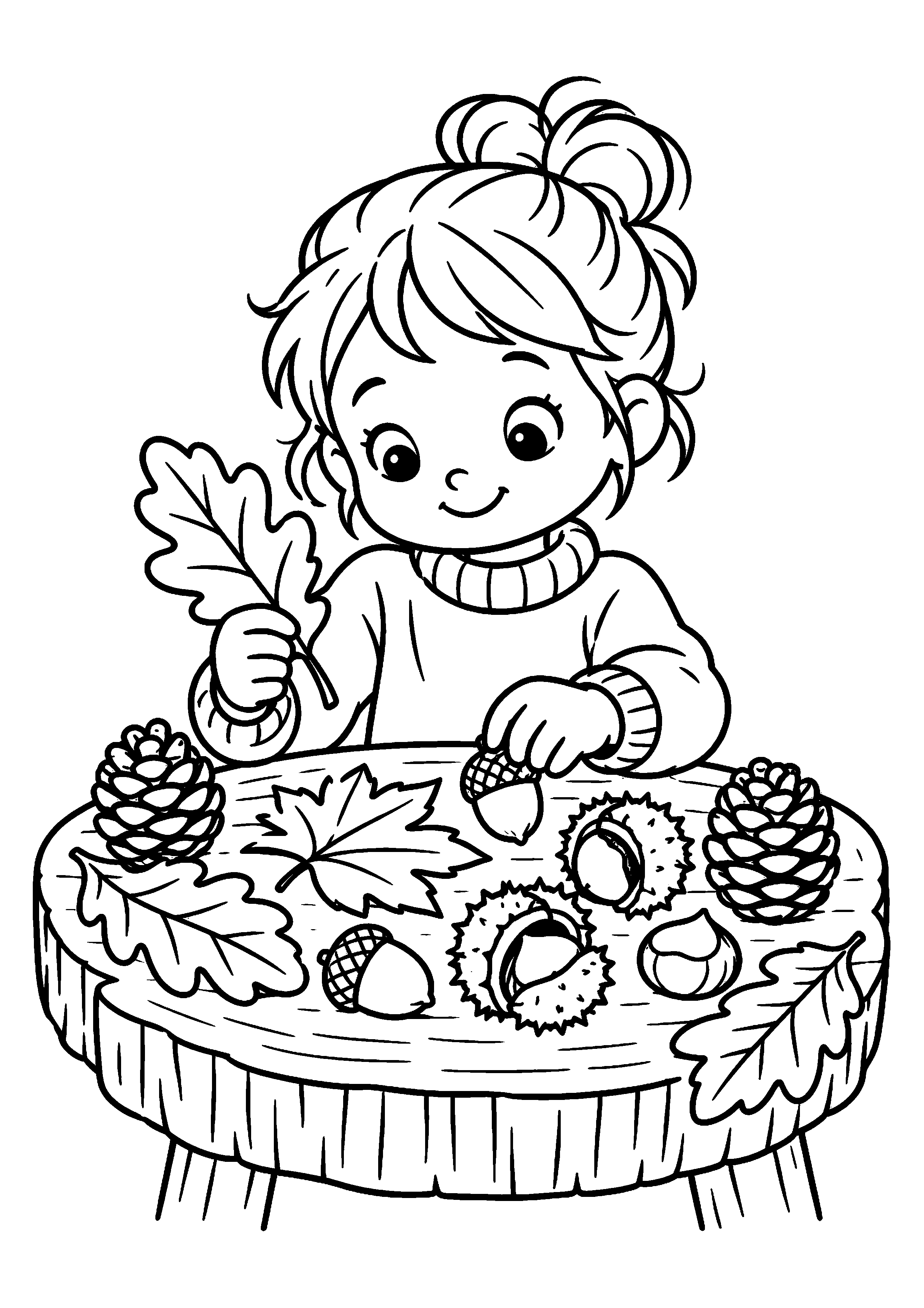 Enfant disposant feuilles, glands et pommes de pin sur une table